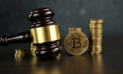 Tinywow Tinywow Auction Gavel And Bitcoin Cryptocurrency Money On A Wooden Desk 59647278 59647325.jpg