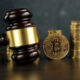 Tinywow Tinywow Auction Gavel And Bitcoin Cryptocurrency Money On A Wooden Desk 59647278 59647325.jpg