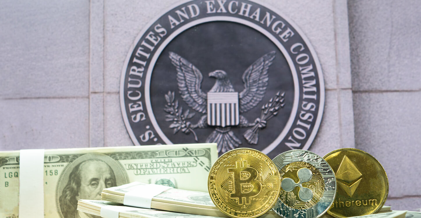 04 An Image Of Crypto Coins And Fiat Money In Front Of The Sec Logo.jpg