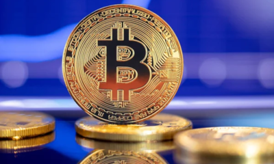 Depositphotos 339750616 Stock Photo Gold Bitcoin Crypto Currency On.png