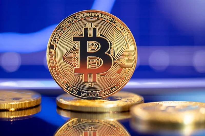 Depositphotos 339750616 Stock Photo Gold Bitcoin Crypto Currency On.png